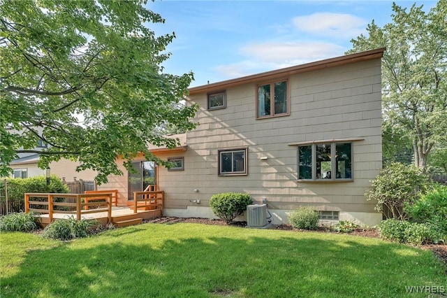 47 Brian Ave, Amherst, NY 14221 - rear view of property featuring a wooden deck and a lawn