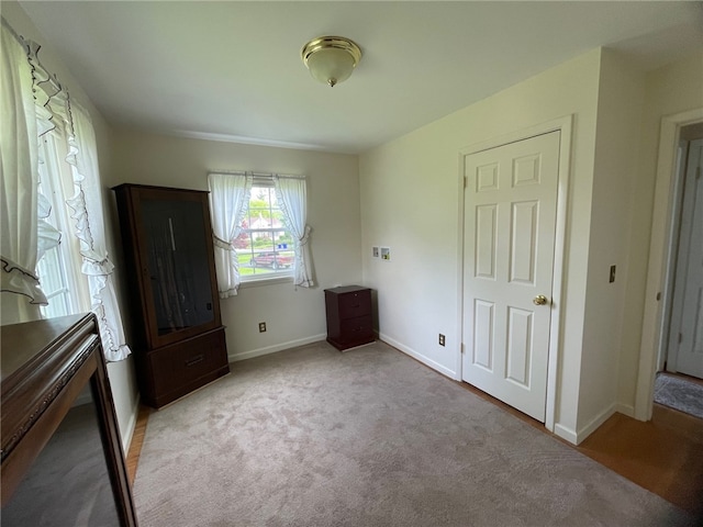100 Huffer Rd, Parma, NY 14468 - unfurnished bedroom with carpet flooring and baseboards