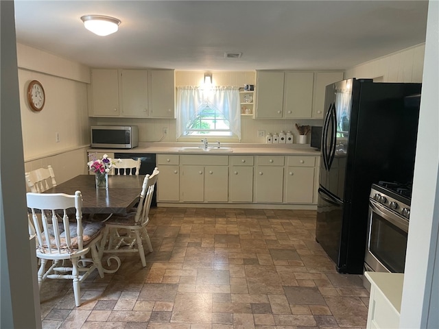 100 Huffer Rd, Parma, NY 14468 - kitchen featuring appliances with stainless steel finishes and light countertops