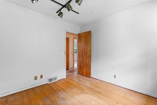 39 Scotch Ln, Irondequoit, NY 14617 - empty room with light wood-style floors and baseboards