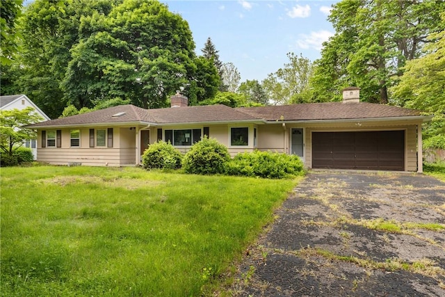 39 Scotch Ln, Irondequoit, NY 14617 - ranch-style house with a chimney, asphalt driveway, an attached garage, and a front yard