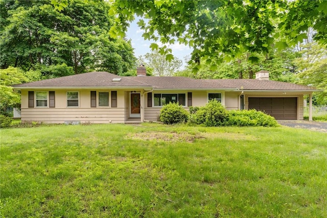 39 Scotch Ln, Irondequoit, NY 14617 - ranch-style home featuring a chimney, an attached garage, asphalt driveway, and a front lawn