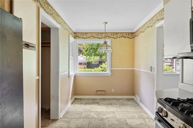 39 Scotch Ln, Irondequoit, NY 14617 - unfurnished dining area featuring healthy amount of natural light, crown molding, and wallpapered walls