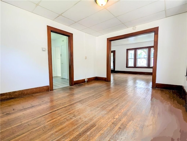 64 Saint Jacob St, Rochester, NY 14621 - empty room featuring a drop ceiling, wood finished floors, and a smoke detector