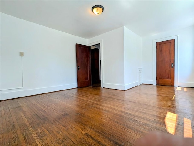 64 Saint Jacob St, Rochester, NY 14621 - spare room featuring baseboards and wood finished floors