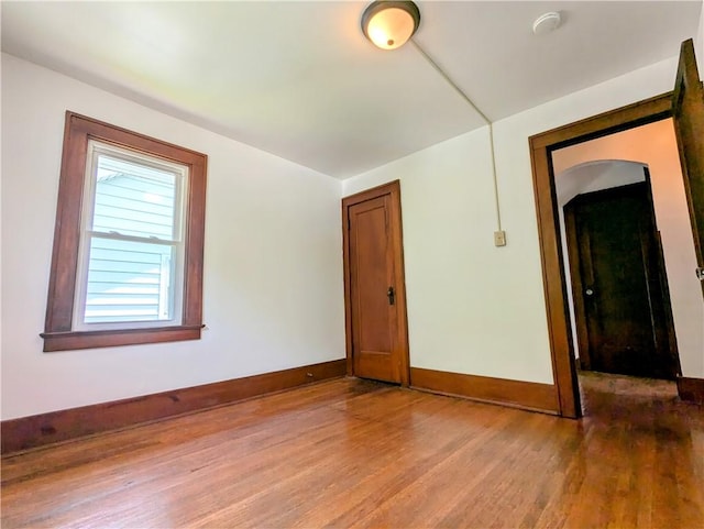 64 Saint Jacob St, Rochester, NY 14621 - spare room with wood finished floors and a smoke detector