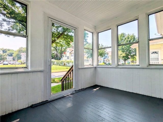 64 Saint Jacob St, Rochester, NY 14621 - unfurnished sunroom featuring wooden walls and hardwood / wood-style flooring
