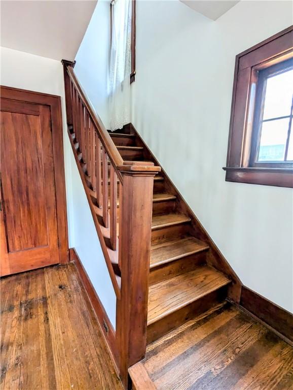 64 Saint Jacob St, Rochester, NY 14621 - stairs with wood-type flooring