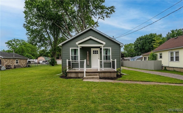 365 Oakdale Dr, North Tonawanda, NY 14120 - shotgun-style home with a porch
