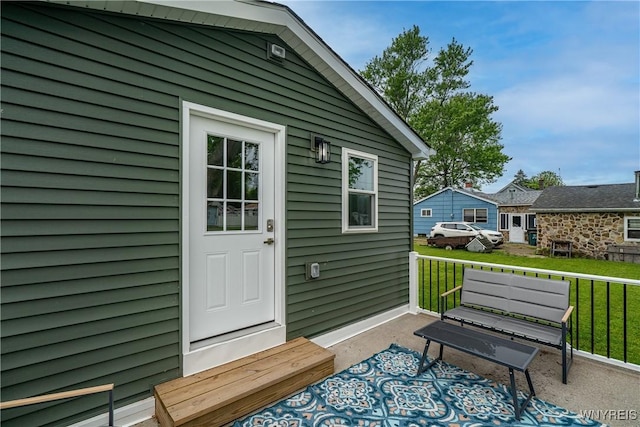 365 Oakdale Dr, North Tonawanda, NY 14120 - view of exterior entry with a lawn