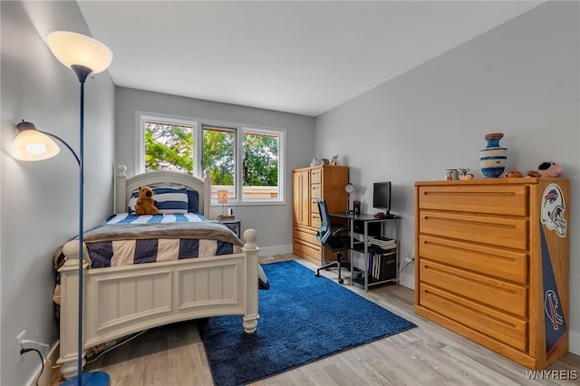 1202 Netherton Ct, Amherst, NY 14051 - bedroom featuring wood finished floors and baseboards