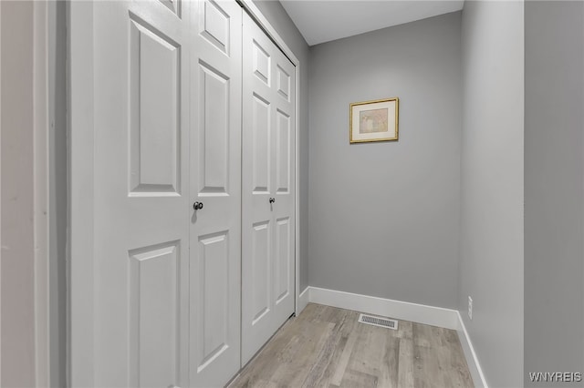 1202 Netherton Ct, Amherst, NY 14051 - corridor featuring light wood-style floors and baseboards