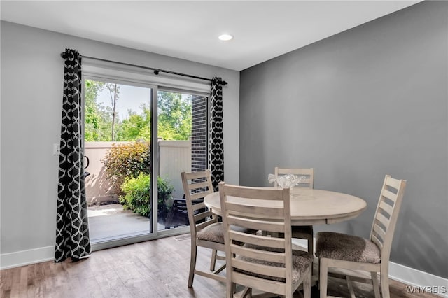 1202 Netherton Ct, Amherst, NY 14051 - dining area featuring wood finished floors and recessed lighting