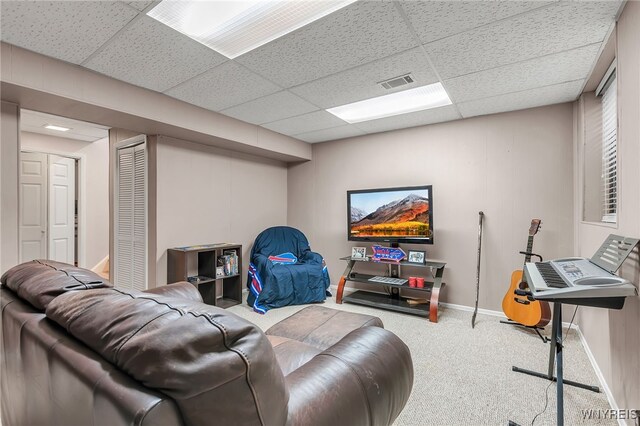 1202 Netherton Ct, Amherst, NY 14051 - carpeted living room featuring baseboards and a drop ceiling