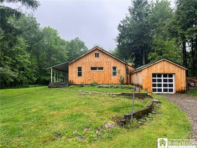 151 Chipmonk Rd, Allegany, NY 14753 - view of front of house featuring driveway, a front yard, and a garage