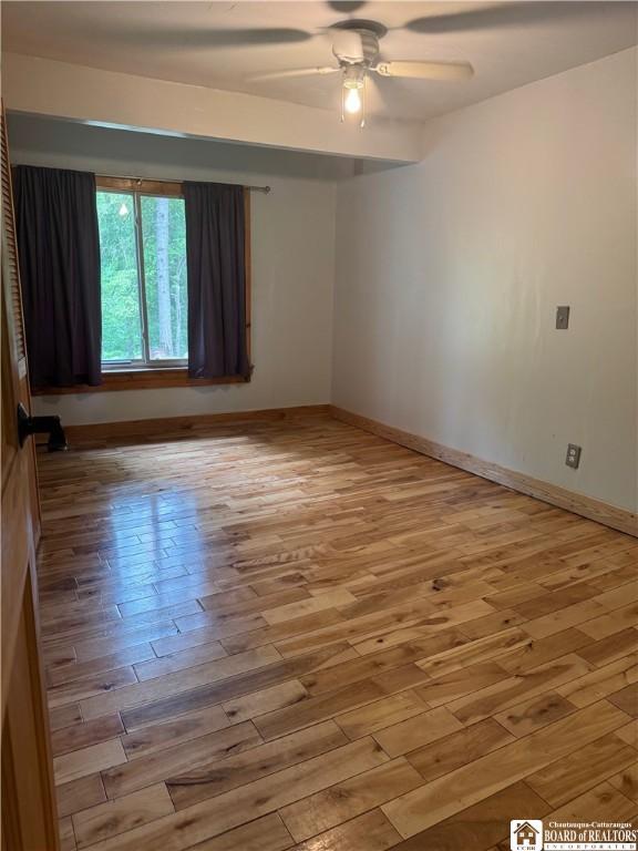 151 Chipmonk Rd, Allegany, NY 14753 - empty room with wood finished floors and a ceiling fan
