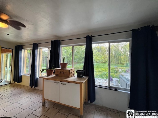 151 Chipmonk Rd, Allegany, NY 14753 - kitchen with white cabinets, ceiling fan, and healthy amount of natural light