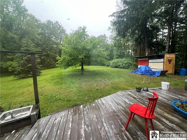 151 Chipmonk Rd, Allegany, NY 14753 - deck featuring a yard and a storage shed
