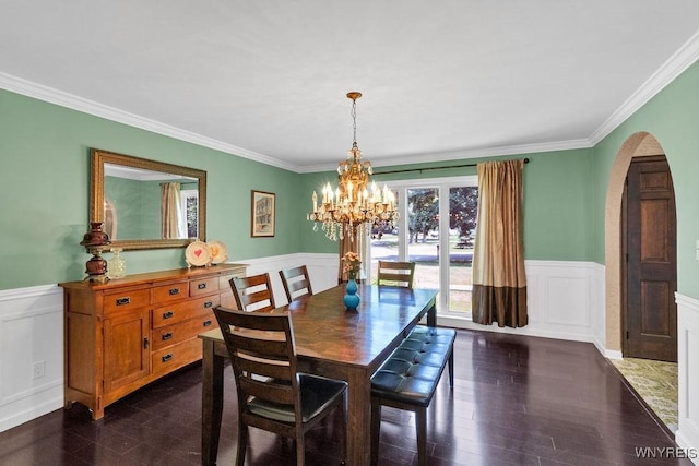 212 Crestwood Ln, Amherst, NY 14221 - dining room featuring wainscoting, plenty of natural light, crown molding, a chandelier, and a decorative wall
