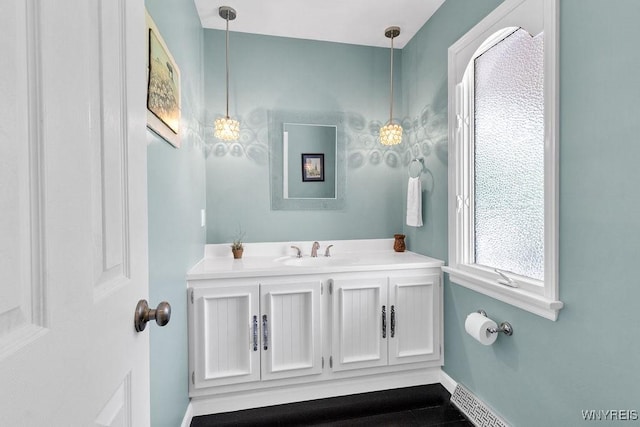 212 Crestwood Ln, Amherst, NY 14221 - bathroom featuring vanity and baseboards