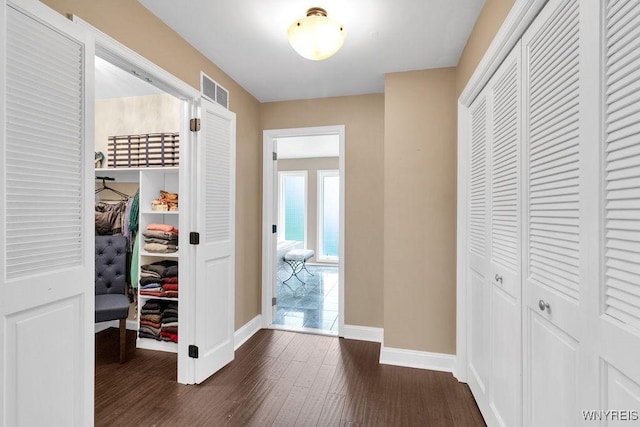 212 Crestwood Ln, Amherst, NY 14221 - corridor featuring baseboards and dark wood-style flooring
