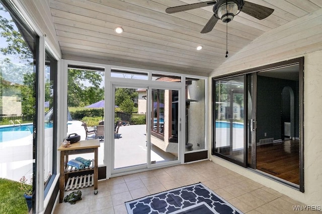 212 Crestwood Ln, Amherst, NY 14221 - sunroom / solarium with lofted ceiling, wood ceiling, tile patterned floors, a ceiling fan, and recessed lighting