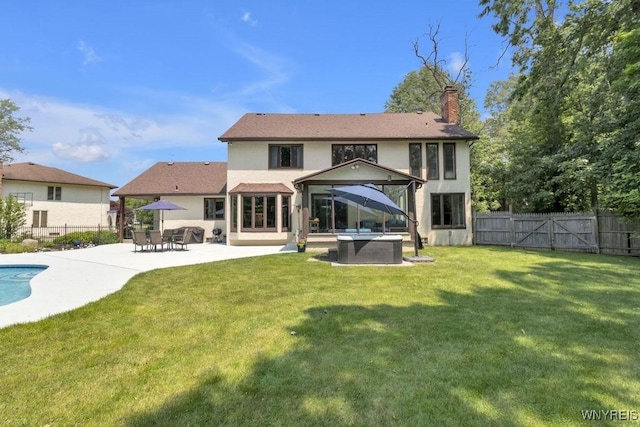 212 Crestwood Ln, Amherst, NY 14221 - rear view of house with a patio, a fenced backyard, stucco siding, a chimney, and a gate