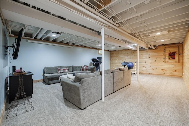 679 Galleon Dr, Webster, NY 14580 - living area featuring carpet floors, wooden walls, and recessed lighting