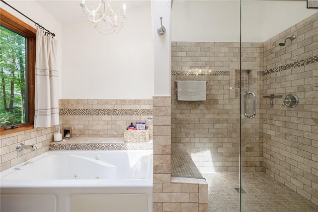 679 Galleon Dr, Webster, NY 14580 - full bath featuring a jetted tub, a stall shower, and a chandelier