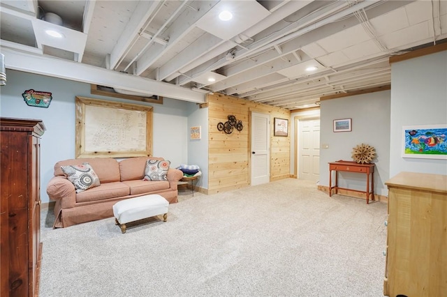 679 Galleon Dr, Webster, NY 14580 - carpeted living room featuring wood walls and recessed lighting