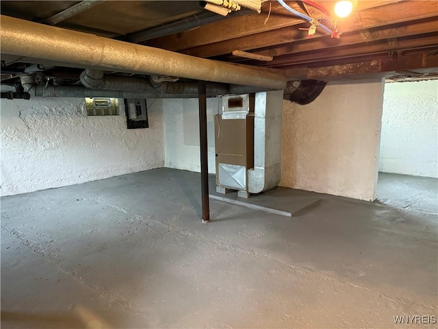 17 Orchard Ave, Evans, NY 14006 - unfinished basement with heating unit and electric panel