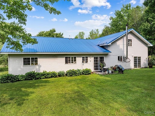 10066 Point Rock Rd, Lee, NY 13440 - back of property with a lawn and a metal roof