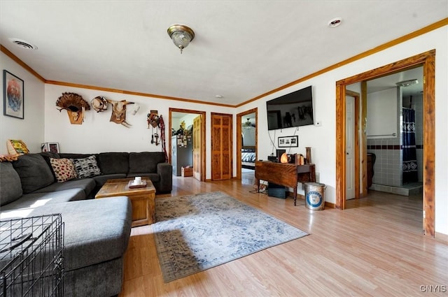 10066 Point Rock Rd, Lee, NY 13440 - living area featuring ornamental molding and wood finished floors