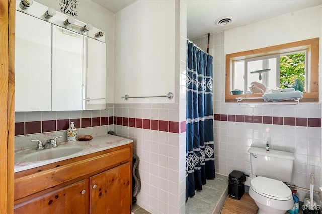 10066 Point Rock Rd, Lee, NY 13440 - full bath with tile walls, vanity, and a shower with curtain