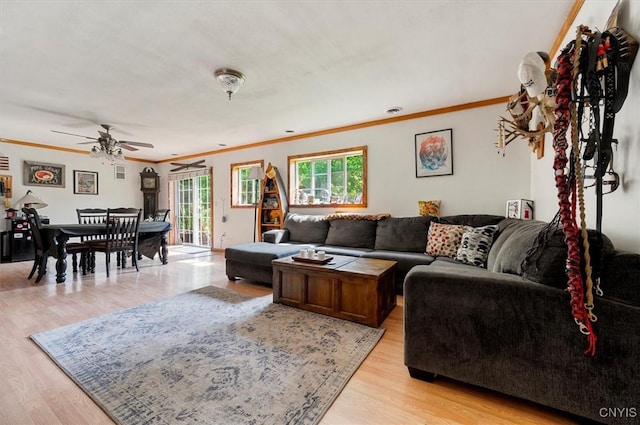 10066 Point Rock Rd, Lee, NY 13440 - living area featuring crown molding, ceiling fan, and light wood finished floors