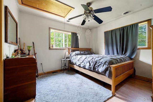 10066 Point Rock Rd, Lee, NY 13440 - bedroom with attic access, wood finished floors, and a ceiling fan