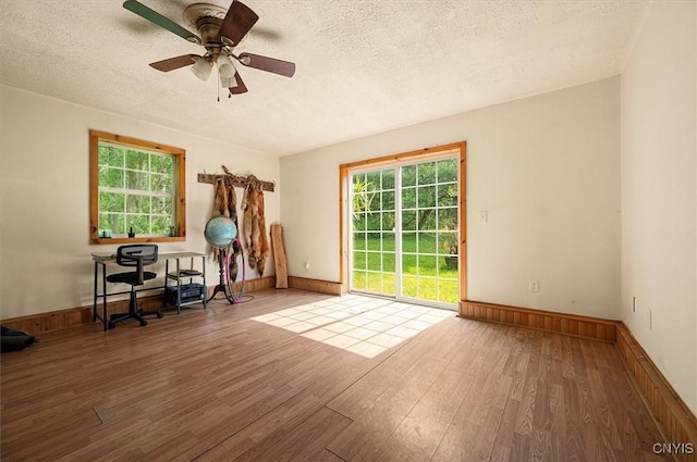 10066 Point Rock Rd, Lee, NY 13440 - office area with a textured ceiling, wood finished floors, and plenty of natural light