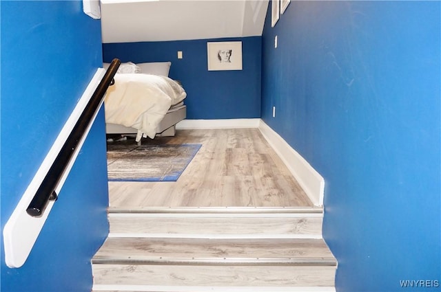 125 Edward St Unit 3I, Buffalo, NY 14201 - bedroom with wood finished floors and lofted ceiling
