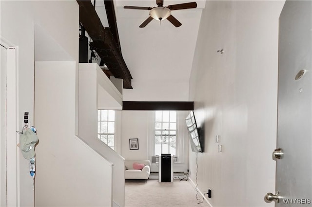 125 Edward St Unit 3I, Buffalo, NY 14201 - foyer entrance featuring ceiling fan, a towering ceiling, carpet floors, and beamed ceiling