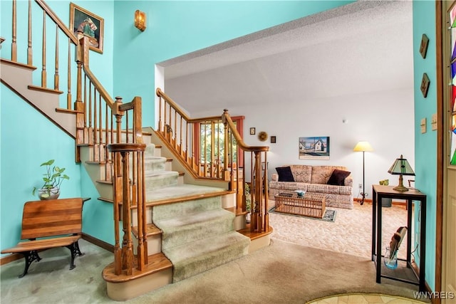 3851 Upper Mountain Rd, Cambria, NY 14132 - stairway with carpet flooring and baseboards