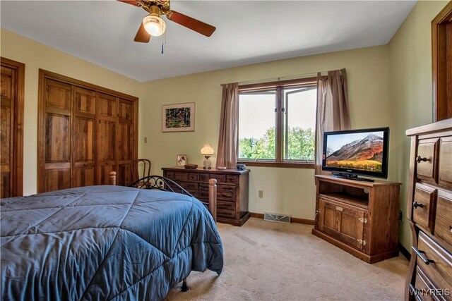 3851 Upper Mountain Rd, Cambria, NY 14132 - bedroom with light carpet and a ceiling fan