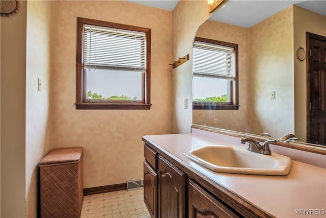 3851 Upper Mountain Rd, Cambria, NY 14132 - bathroom with tile patterned floors and vanity