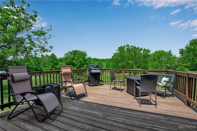 3851 Upper Mountain Rd, Cambria, NY 14132 - wooden deck with a grill