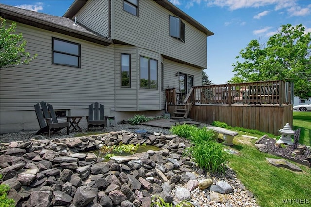 3851 Upper Mountain Rd, Cambria, NY 14132 - back of property with a wooden deck