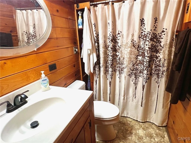 13 Popple Hill Rd, Fowler, NY 13642 - full bathroom with wooden walls, vanity, and a shower with shower curtain