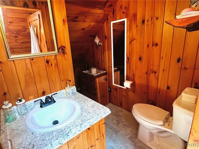 13 Popple Hill Rd, Fowler, NY 13642 - bathroom with wooden walls, lofted ceiling, and vanity