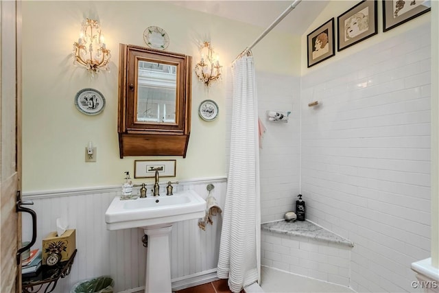 2761 State Route 12b, Marshall, NY 13328 - bathroom with a tile shower and a wainscoted wall