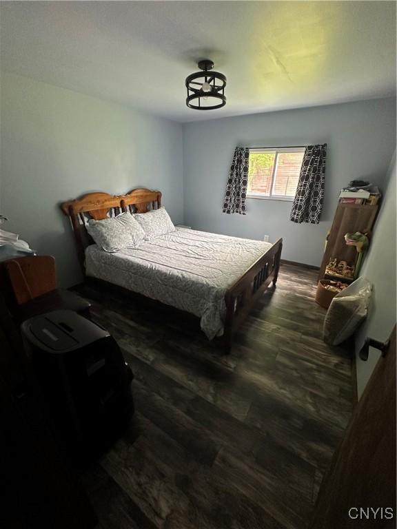 14309 Pearl St, Diana, NY 13648 - bedroom featuring wood finished floors