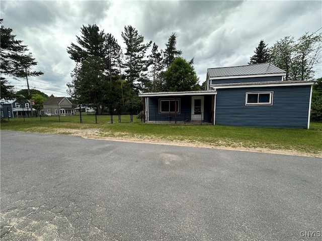 14309 Pearl St, Diana, NY 13648 - view of front of property with a metal roof and covered porch