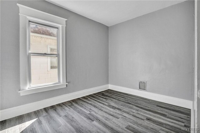 110 Weyand Ave, Buffalo, NY 14210 - spare room featuring baseboards and wood finished floors